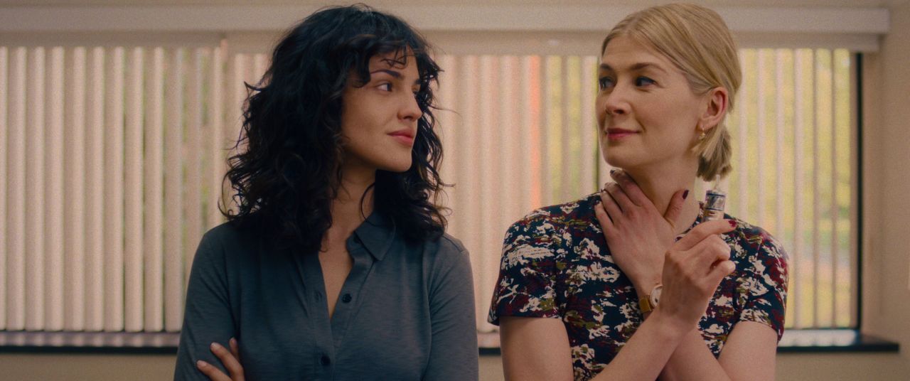 Eiza González as Fran and Rosamund Pike as Marla.