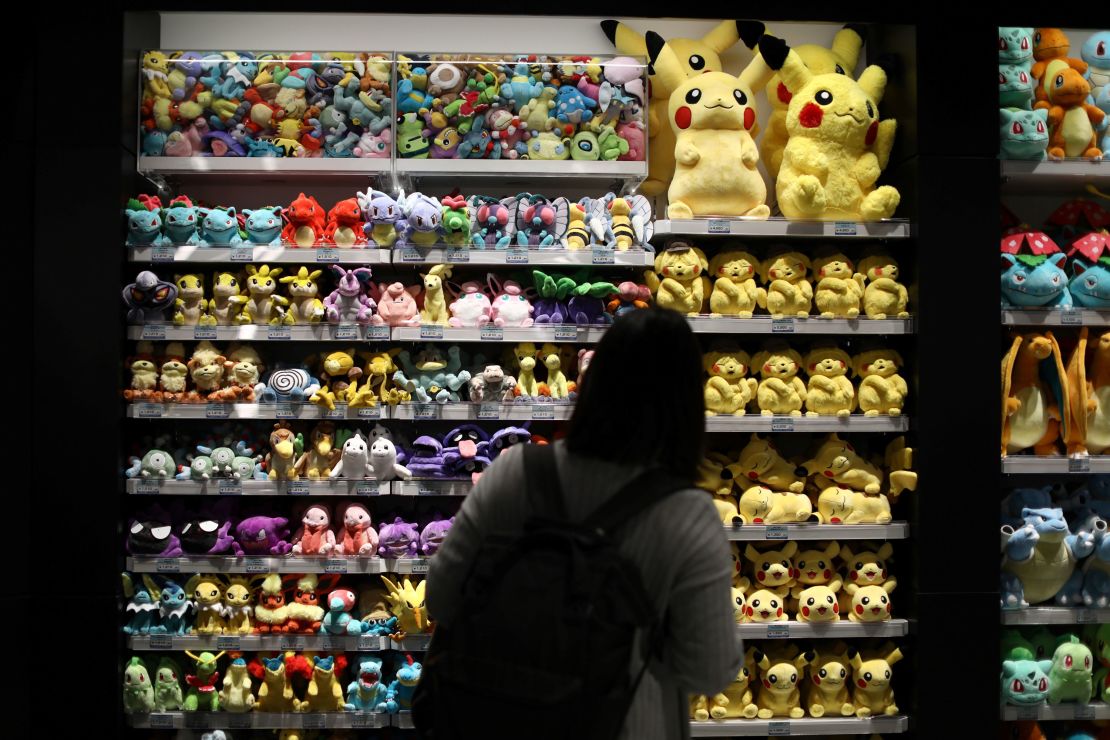 A woman browses goods at a Pokémon store in Tokyo.