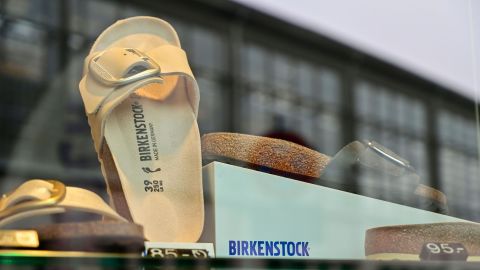 Birkenstock sandals are pictured in a store window at the company's store in Berlin.