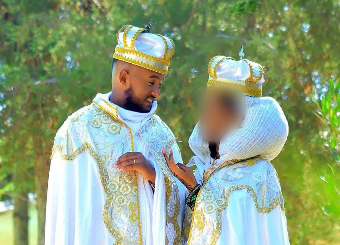 Biniam, left, and Marta on their wedding day.