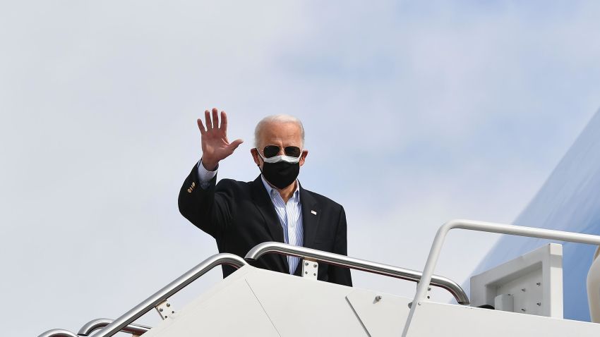 US President Joe Biden boards Air Force One at Joint Base Andrews in Maryland on February 26, 2021. - President Biden travels to Texas to visit a food bank and emergency operations center after a winter storm left millions without electricity and clean water for days. (Photo by MANDEL NGAN / AFP) (Photo by MANDEL NGAN/AFP via Getty Images)