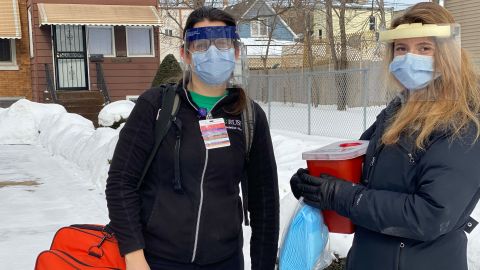 Dr. Elizabeth Davis and Dr. Jennifer Zakko are part of a mobile vaccination team going to patients' homes to administer the vaccine. 
