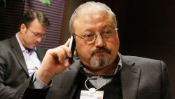 FILE - In this Jan. 29, 2011 file photo, Saudi journalist Jamal Khashoggi speaks on his cellphone at the World Economic Forum in Davos, Switzerland. Saud Al-Mojeb, Saudi Arabia's top prosecutor, is recommending the death penalty for five suspects charged with ordering and carrying out the killing of Saudi writer Jamal Khashoggi. Al-Mojeb told a press conference in Riyadh Thursday, Nov. 15, 2018,  that Khashoggi's killers had been planning the operation since September 29, three days before he was killed inside the kingdom's consulate in Istanbul. (AP Photo/Virginia Mayo, File)