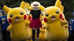 Performers dressed as Pikachu during a "Pikachu Outbreak" event hosted bin Yokohama, Japan, in 2018.