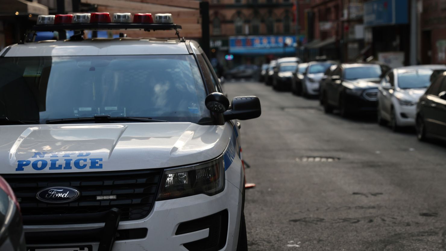 A police car drives through Manhattan on January 14, 2021, in New York City. 