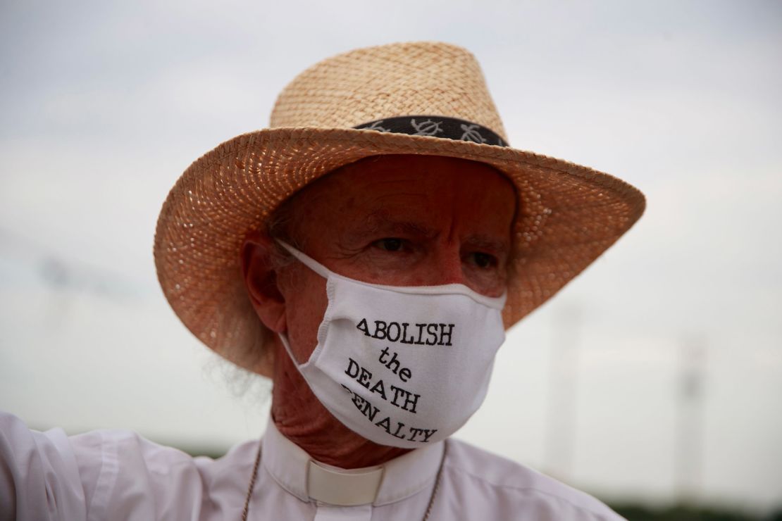 Rev. Bill Breeden stands outside the Terre Haute Federal Correctional Complex to protest before death row inmate Wesley Ira Purkey was scheduled to be executed by lethal injection.