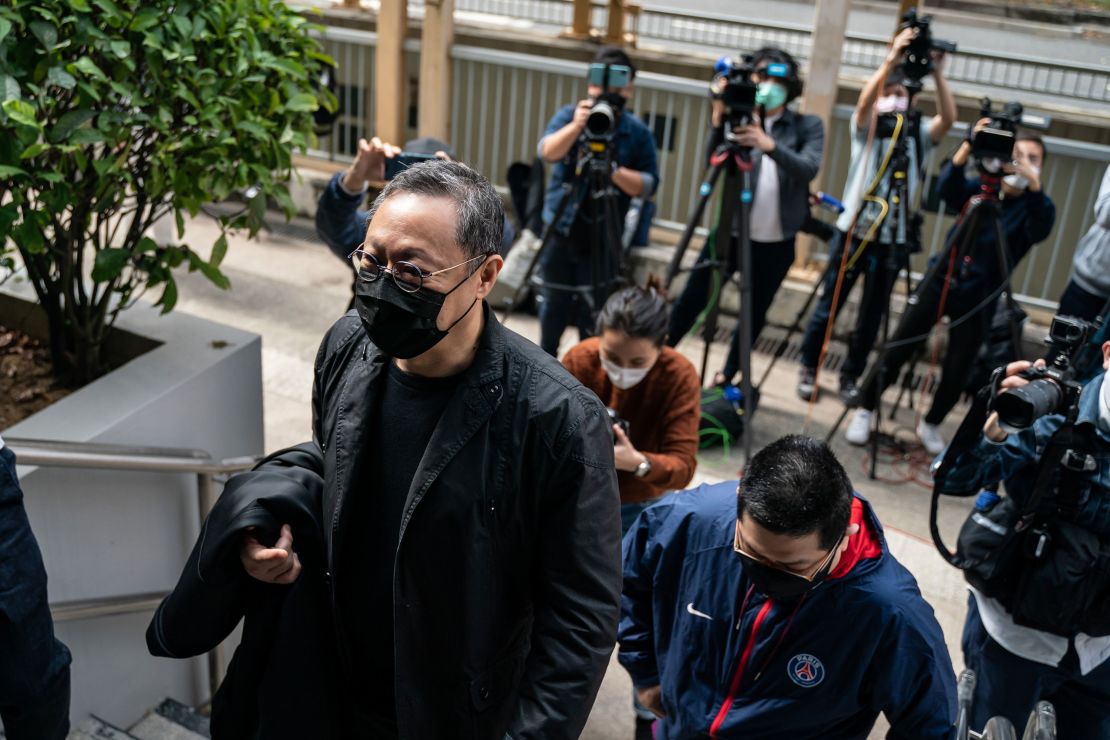 Benny Tai, associate professor of law at the University of Hong Kong and co-founder of activist group Occupy Central with Love and Peace (OCLP) reports to the Ma On Shan Police Station on February 28, in Hong Kong.