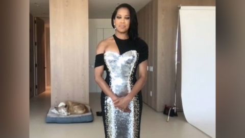 Regina King during her Golden Globes pre-show interview with her dog, Cornbread, in the background on Sunday, February 28, 2021. 