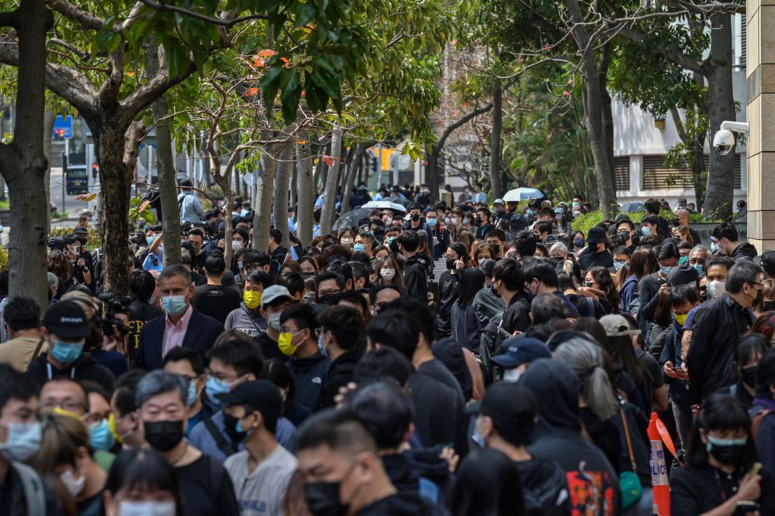 Supporters wait outside West Kowloon court in Hong Kong on March 1, 2021.