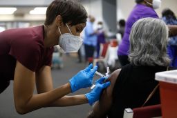 A health care worker administers the Moderna Covid-19 vaccine at the Bible-Based Fellowship Church on February 13 in Tampa, Florida.