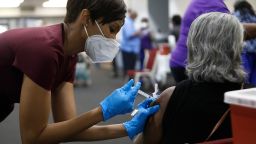 A health care worker administers the Moderna Covid-19 vaccine at the Bible-Based Fellowship Church on February 13 in Tampa, Florida.