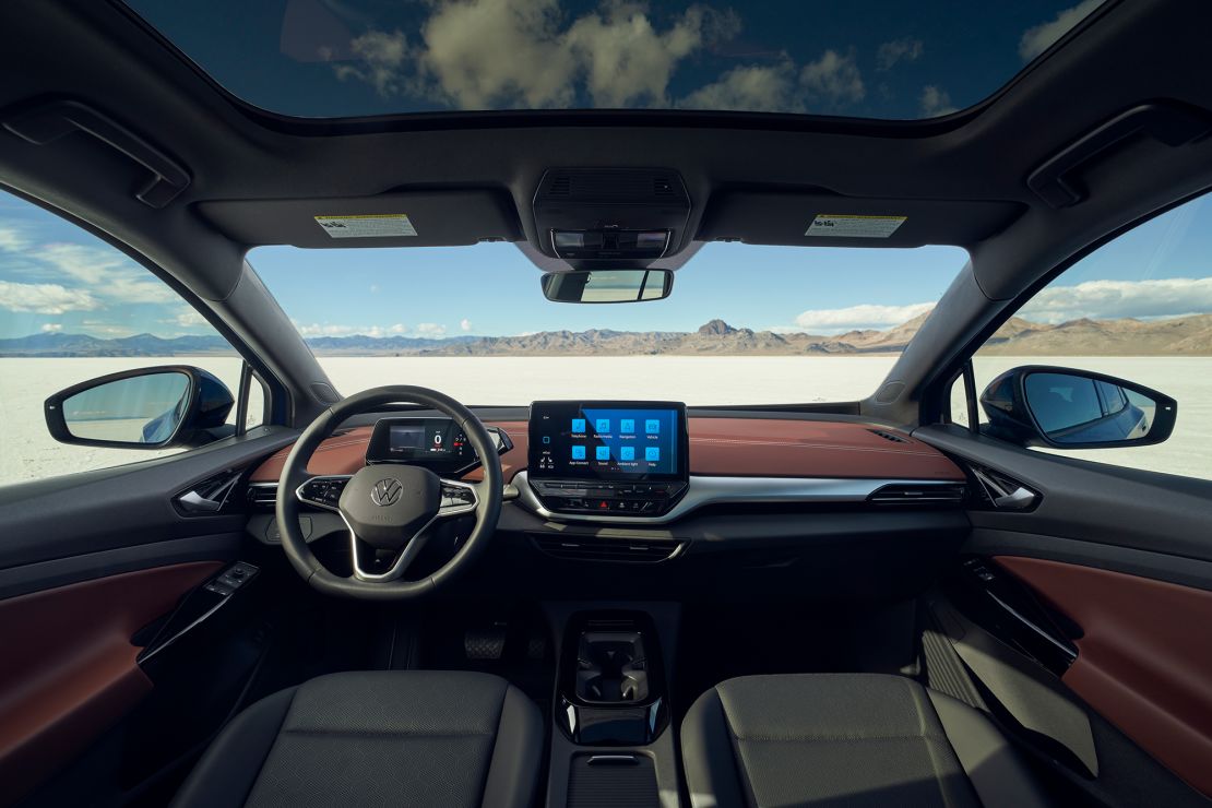 The Volkswagen ID.4 interior includes gauges on a digital screen that  adjusts up and down with the steering wheel.