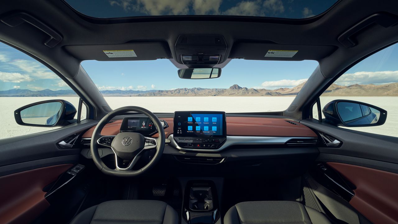 The Volkswagen ID.4 interior includes gauges on a digital screen that adjusts up and down with the steering wheel.