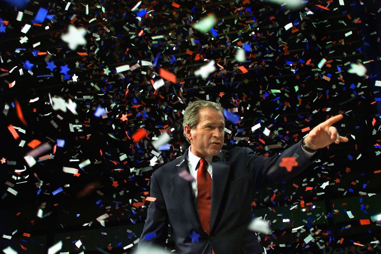 Confetti falls on Bush as he concluded his presidential campaign in Austin, Texas, in November 2000.