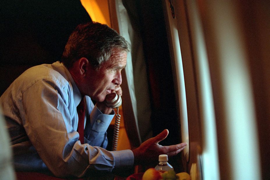 Bush, aboard Air Force One, talks on the phone with Vice President Dick Cheney on September 11, 2001.