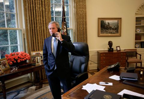 Bush takes a phone call from Kerry, who was conceding the 2004 election.