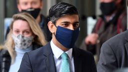 Britain's Chancellor of the Exchequer Rishi Sunak, wearing a protective face covering to combat the spread of the coronavirus, leaves the BBC in central London on February 28, 2021, after appearing on the BBC political programme The Andrew Marr Show. - Britain is to launch a new Infrastructure Bank with £12 billion ($17 bn, 14 bn euros) in capital and £10 billion in government guarantees, the Treasury said Saturday, aimed at kickstarting the economy. Rishi Sunak is expected to announce the initial funding at Wednesday's Budget and the bank will launch in spring, the Treasury said. (Photo by Justin Tallis/AFP/Getty Images)