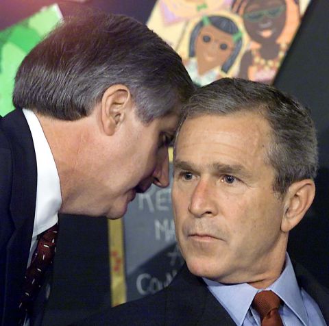 White House Chief of Staff Andrew Card informs Bush about the September 11 terrorist attacks in 2001. At the time, the President was visiting a school in Sarasota, Florida.