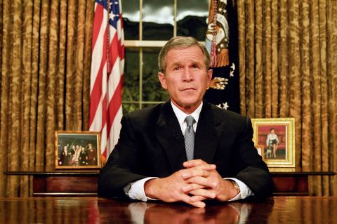 Bush prepares to address the nation on the evening of September 11. "Terrorist attacks can shake the foundations of our biggest buildings, but they cannot touch the foundation of America," he said in his remarks. "These acts shatter steel, but they cannot dent the steel of American resolve."