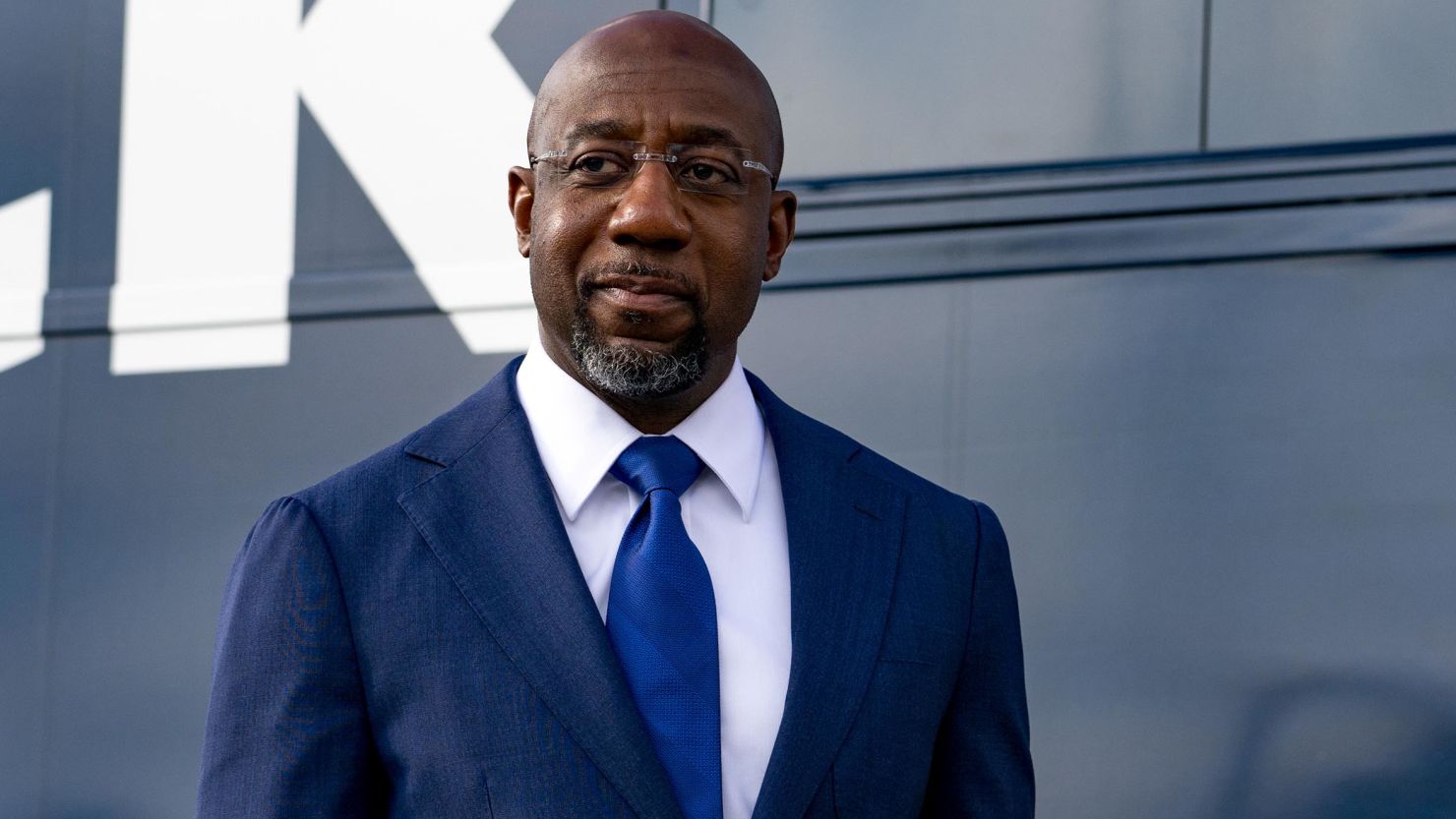 Then-Georgia Democratic Candidate Rev. Raphael Warnock meets with supporters on January 5, 2021 in Marietta, Georgia. Warnock won his seat but faces a reelection battle next year. 