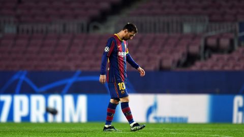 Lionel Messi trudges off after Barcelona's recent hammering at the hands of PSG.