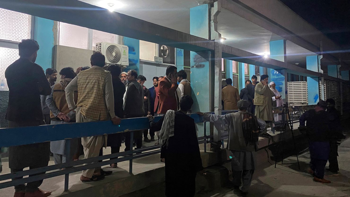 Relatives wait outside a hospital for the bodies of three women that were killed in the city of Jalalabad, Afghanistan, on March 2.