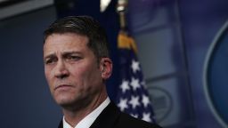 WASHINGTON, DC - JANUARY 16:  Physician to U.S. President Donald Trump Dr. Ronny Jackson listens during the daily White House press briefing at the James Brady Press Briefing Room of the White House January 16, 2018 in Washington, DC. Dr. Jackson discussed the details of President TrumpÕs physical check-up from last week.  (Photo by Alex Wong/Getty Images)