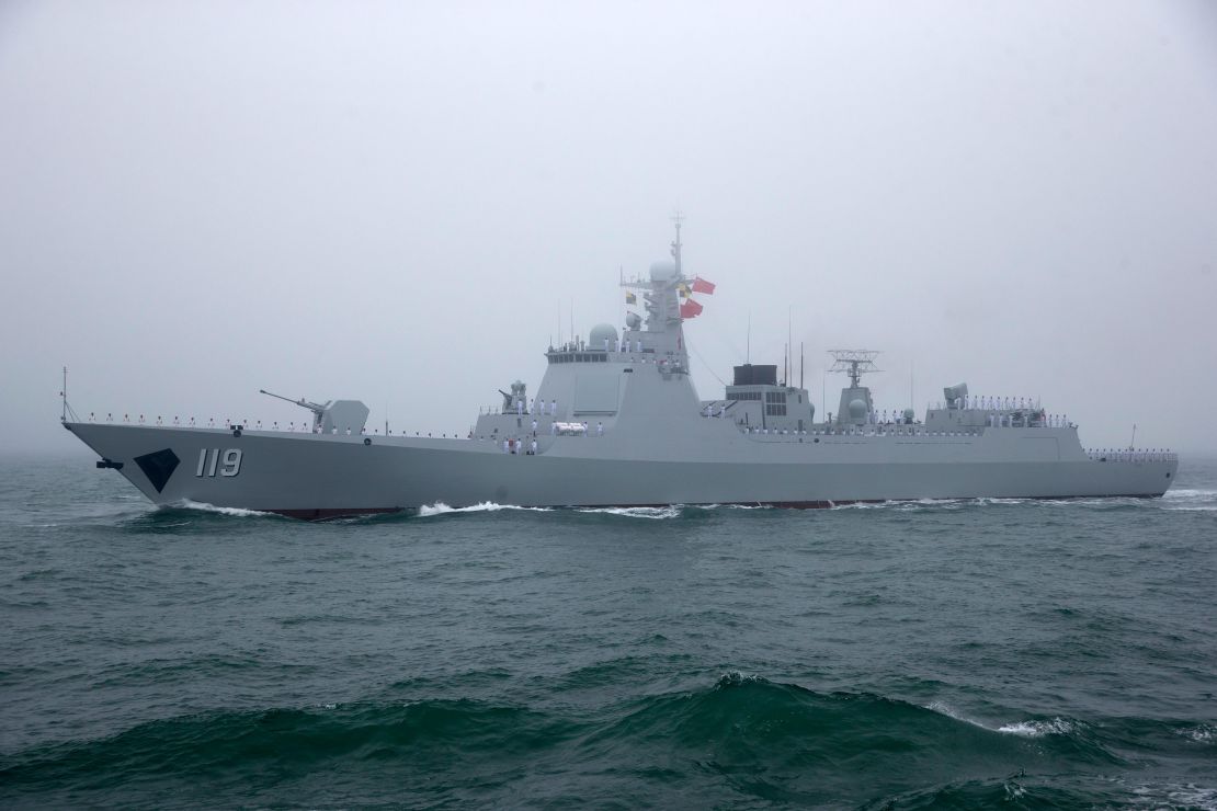 A Type 052D Chinese guided missile destroyer participates in a naval parade to commemorate the 70th anniversary of the founding of China's PLA Navy in 2019. 