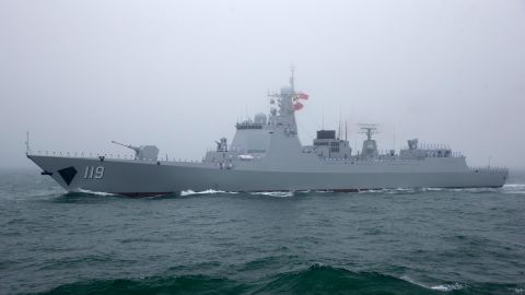 A Type 052D Chinese guided missile destroyer participates in a naval parade to commemorate the 70th anniversary of the founding of China's PLA Navy in 2019. 