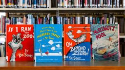 Dr. Seuss childrens' books, from left, "If I Ran the Zoo," "And to Think That I Saw It on Mulberry Street," "On Beyond Zebra!" and "McElligot's Pool" are displayed at the North Pocono Public Library in Moscow, Pa., Tuesday, March 2, 2021.