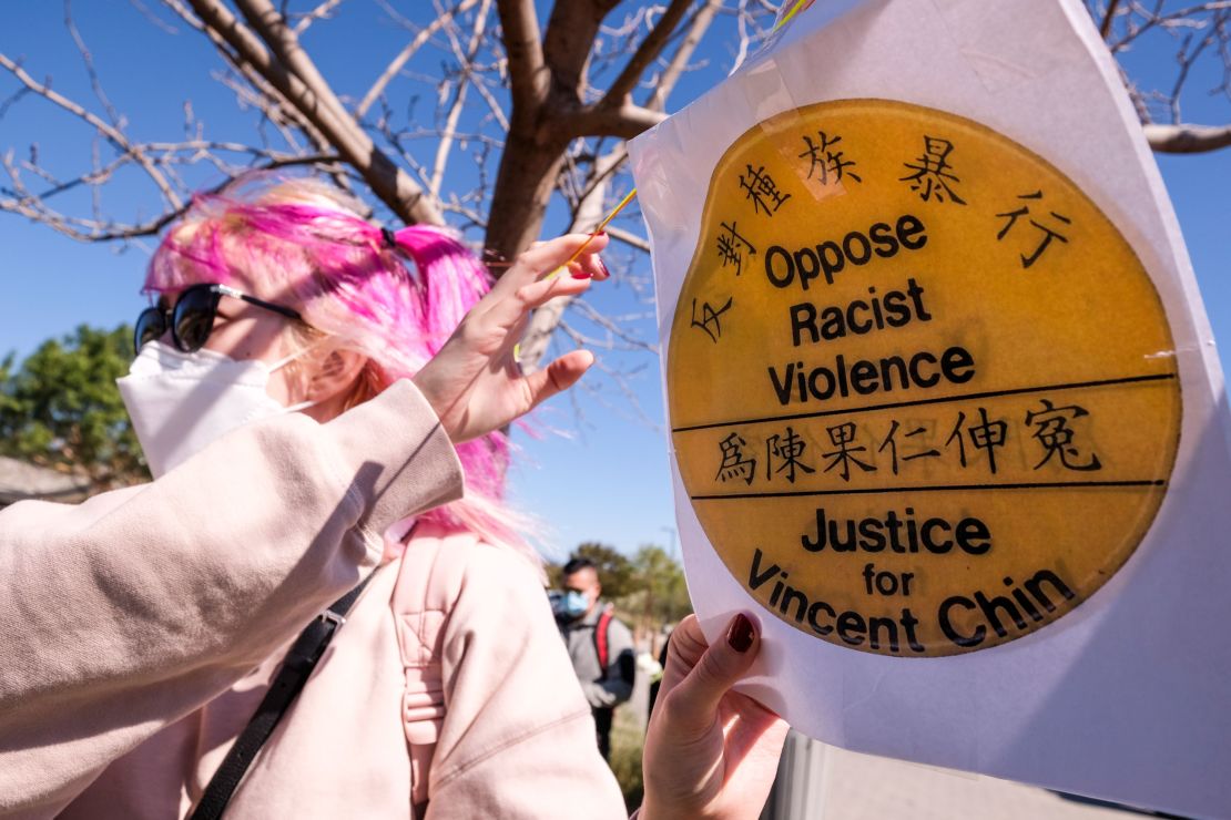 A demonstrator takes part in a rally on February 20 to raise awareness of violence against Asian Americans near Chinatown in Los Angeles.