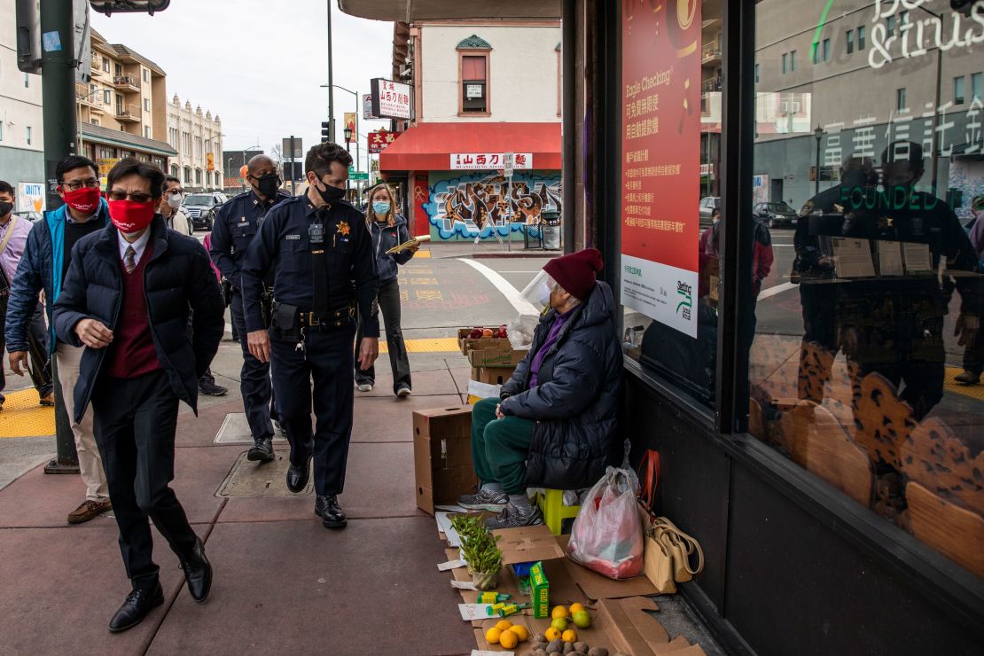 Oakland's deputy chief of police visits businesses around the city's Chinatown on February 16.