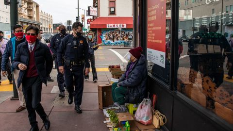Oakland's deputy chief of police visits businesses around the city's Chinatown on February 16.