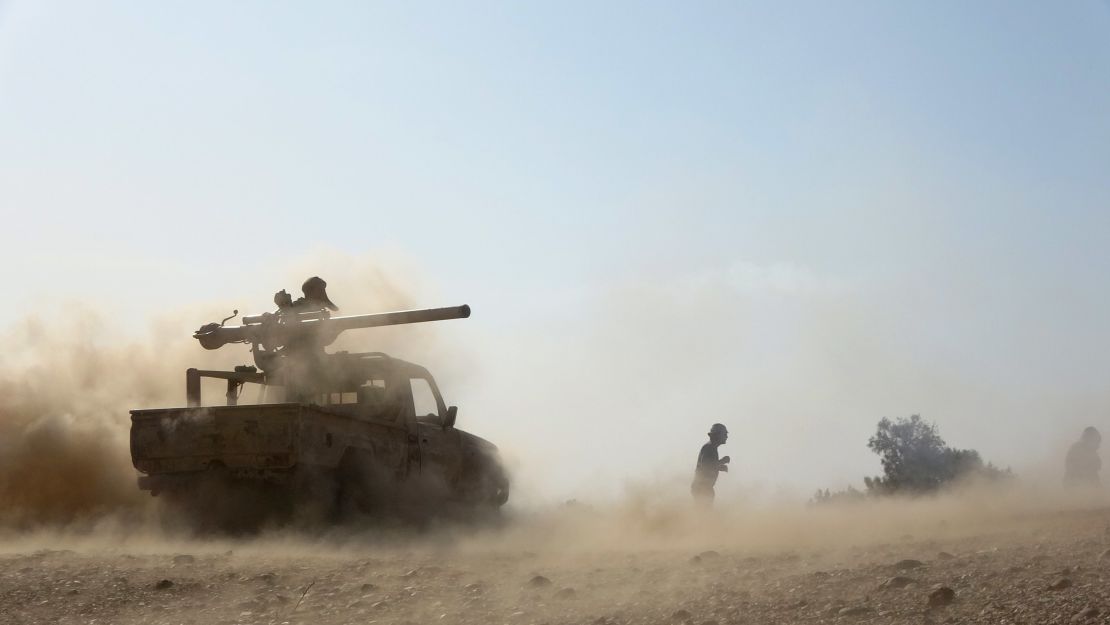 Saudi-backed government troops repel Houthi rebels advancing on oil-rich Marib in February.