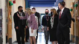 US First Lady Jill Biden (L) waves to students in a classroom as she tours Benjamin Franklin Elementary School with US Education Secretary Miguel Cardona (R) in Meriden, Connecticut, on March 3, 2021. - , (Photo by MANDEL NGAN / POOL / AFP) (Photo by MANDEL NGAN/POOL/AFP via Getty Images)