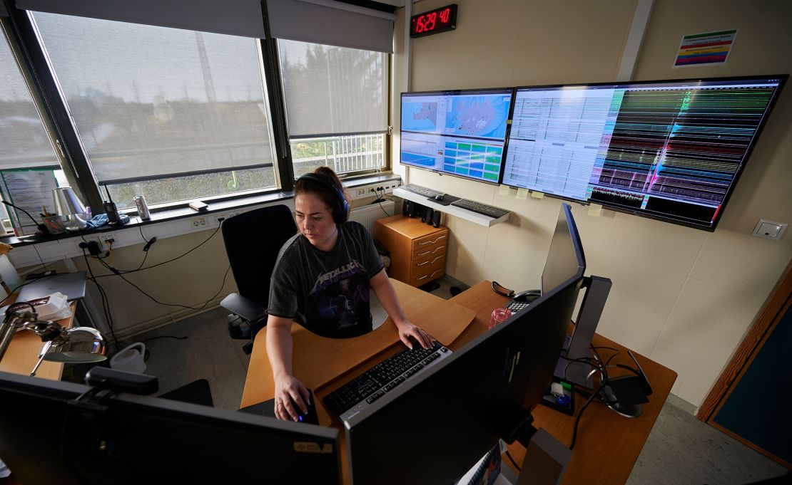 Picture taken on February 27, 2021 shows a natural hazards specialist at the Icelandic Meteorological Office in Reykjavik, which is surveying the situation at the Reykjanes peninsula, Iceland.