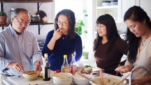 Bill, Judy, Kaitlin and Sarah Leung, pictured from left to right, are the family behind The Woks of Life.