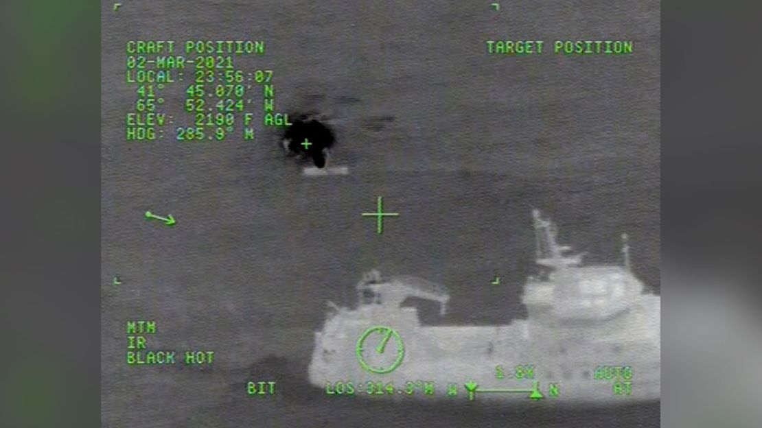 Images released by the US Coast Guard show a rescue helicopter over the stricken vessel Tuesday night.