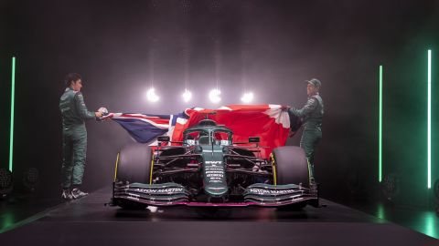 Lance Stroll and Sebastian Vettel unveil the new Aston Martin AMR21.