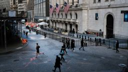 NEW YORK, NEW YORK - FEBRUARY 25: People walk by the New York Stock Exchange (NYSE) on February 25, 2021 in New York City. As a rapid rise in Treasury yields has made equity investors nervous, stocks fell on Thursday with the Dow down 500 points in afternoon trading. (Photo by Spencer Platt/Getty Images)