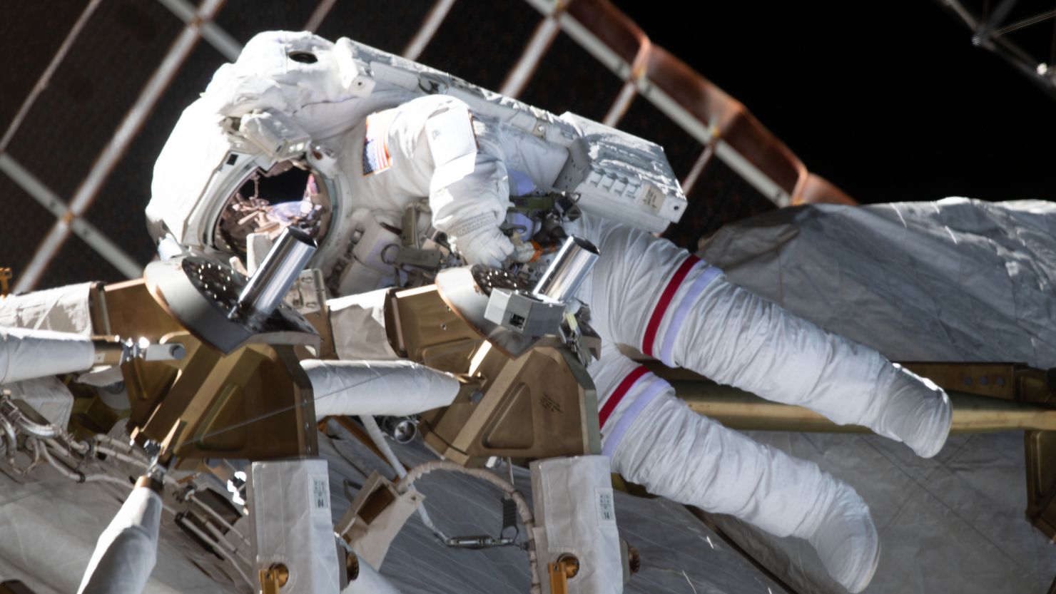  (Feb. 28, 2021) --- NASA astronaut Kate Rubins is pictured during a spacewalk to install solar array modification kits on the International Space Station. The maintenance work will support new, more powerful solar arrays that will be delivered on upcoming SpaceX Dragon cargo missions.