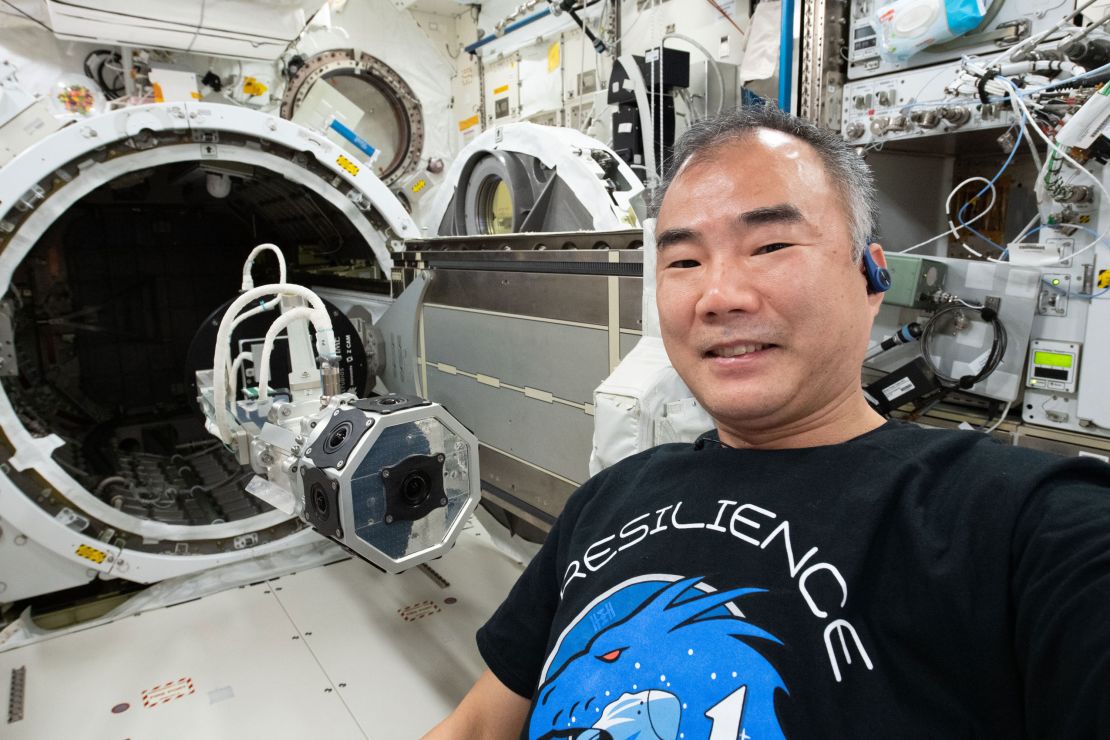 Soichi Noguchi is shown after installing a three-dimensional virtual reality camera on the space station. 