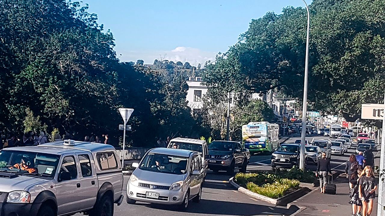 Traffic slowly works up to high ground at Whangarei, New Zealand, as a tsunami warning is issued Friday, March 5, 2021.