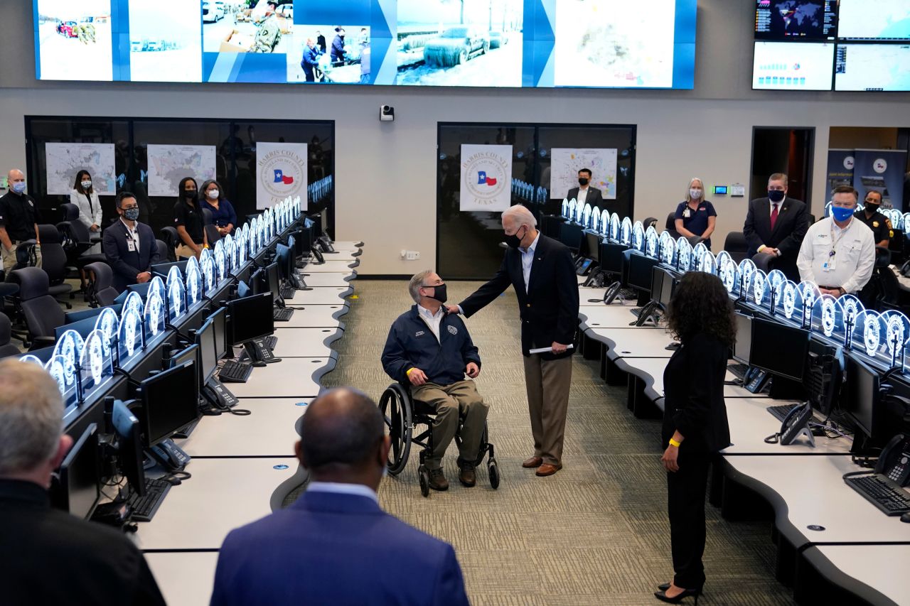 US President Joe Biden talks with Texas Gov. Greg Abbott as they tour the Harris County Emergency Operations Center in Houston on Friday, February 26. <a href="https://www.cnn.com/2021/02/26/politics/biden-texas-visit/index.html" target="_blank">Biden offered comfort and federal support</a> after a severe winter storm battered Texas and left millions without power, heat or water. 