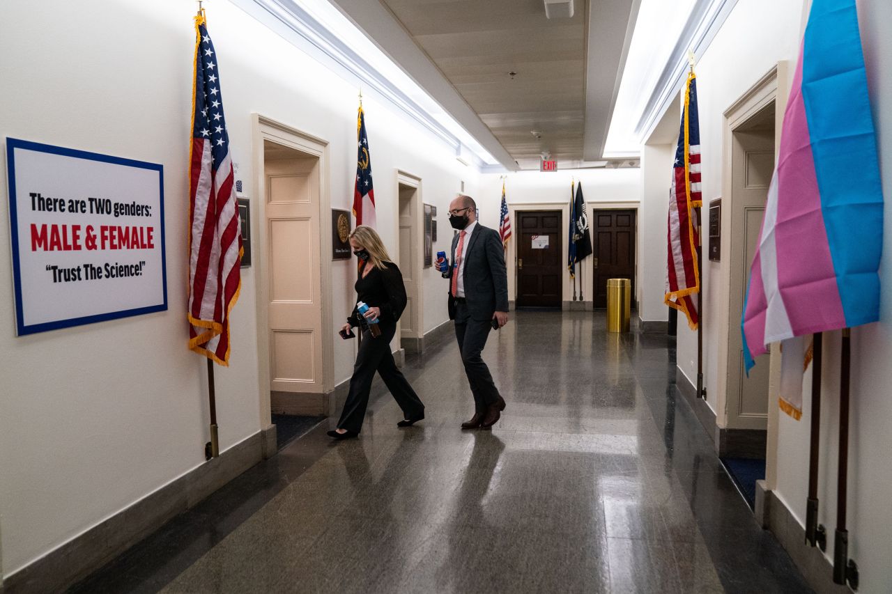 US Rep. Marjorie Taylor Greene walks to her office on Capitol Hill on Thursday, February 25. <a href="https://www.cnn.com/2021/02/25/politics/marjorie-taylor-greene-anti-transgender-sign/index.html" target="_blank">Greene posted an anti-transgender sign outside her office,</a> directly across the hall from US Rep. Marie Newman, whose daughter is transgender.