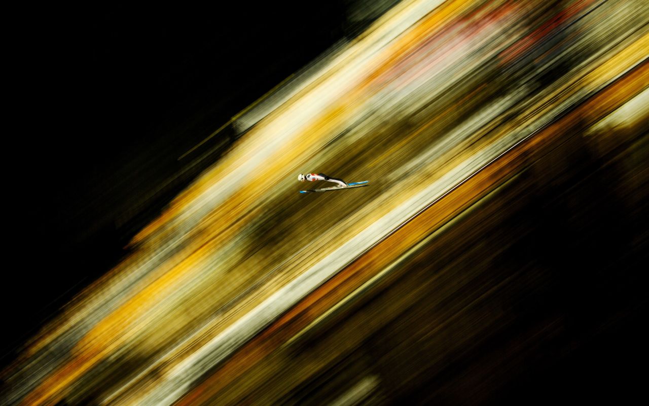 Canadian ski jumper Mackenzie Boyd-Clowes competes in Oberstdorf, Germany, on Friday, February 26. This photo was shot with a slow shutter speed. 