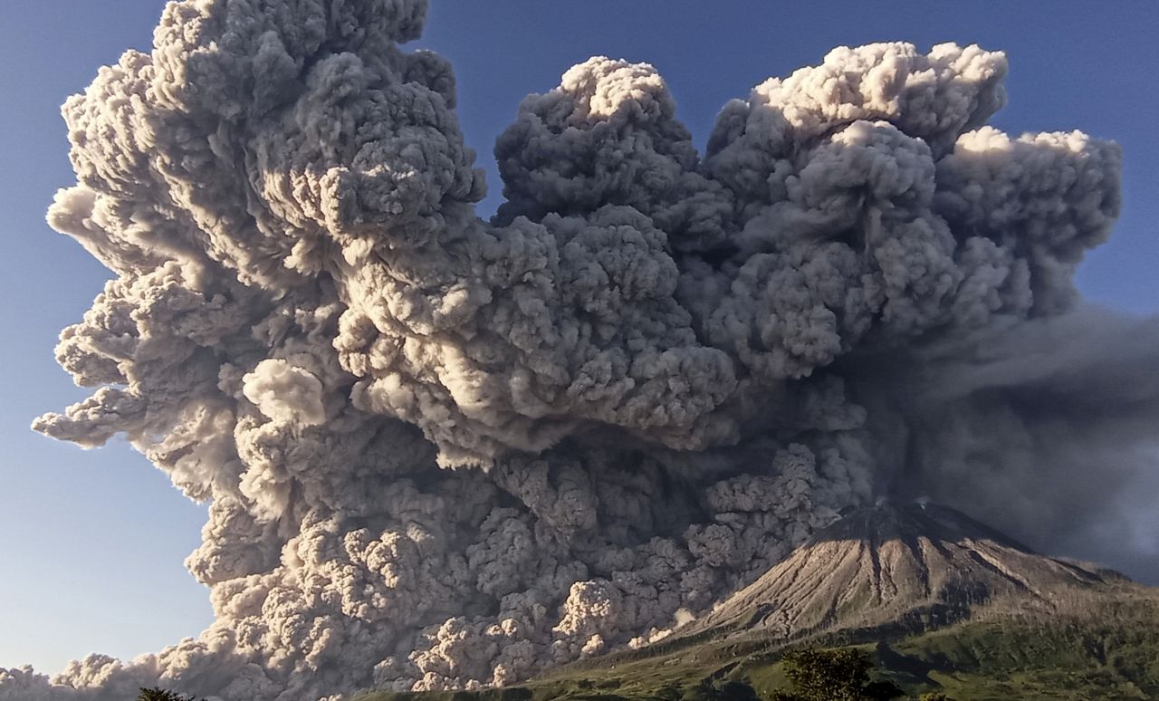 The Mount Sinabung volcano erupts in Karo, Indonesia, on Tuesday, March 2. No one was injured in<a href="https://www.cnn.com/videos/world/2021/03/02/indonesia-volcano-mount-sinabung-erupts-ctw-intl-ldn-vpx.cnn" target="_blank"> the eruption,</a> but authorities have warned people to stay away.