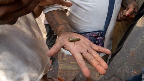 A demonstrator shows a bullet cartridges to the camera during a protest against the military coup in Mandalay, Myanmar on March 3, 2021. 