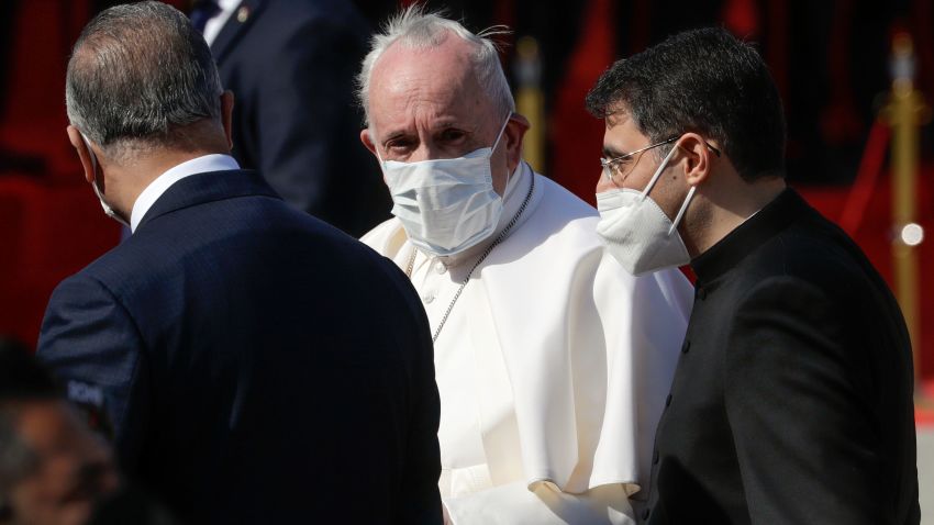 Pope Francis arrives at Baghdad's international airport, Iraq, Friday, March 5, 2021. Pope Francis heads to Iraq on Friday to urge the country's dwindling number of Christians to stay put and help rebuild the country after years of war and persecution, brushing aside the coronavirus pandemic and security concerns. (AP Photo/Andrew Medichini)
