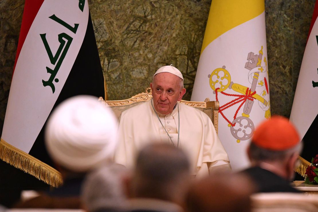 Pope Francis attends a meeting at Iraq's presidential palace in Baghdad.